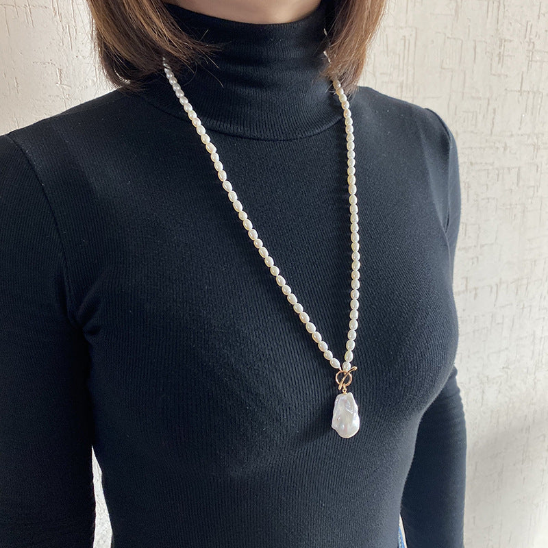 Vintage-inspired Freshwater Baroque Pearl Necklace with OT Clasp, exuding elegance and charm. This timeless piece is perfect for parties and makes a wonderful gift. Comes with a random gift box, ideal for autumn gifting.