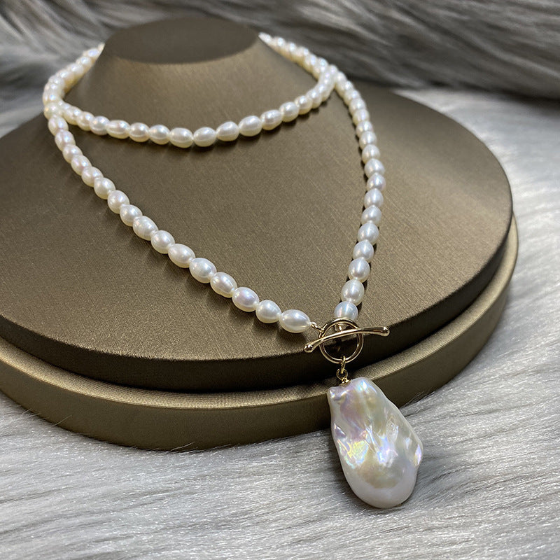 Vintage-inspired Freshwater Baroque Pearl Necklace with OT Clasp, exuding elegance and charm. This timeless piece is perfect for parties and makes a wonderful gift. Comes with a random gift box, ideal for autumn gifting.