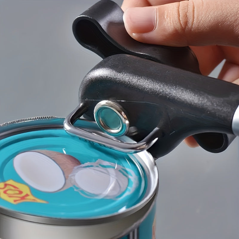 A manual can opener made of stainless steel, featuring a safety smooth edge, non-slip handle, and easy turn adjustable knob for effortless food preparation in the kitchen.