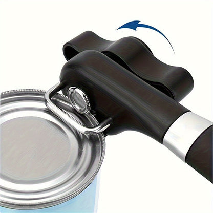 A manual can opener made of stainless steel, featuring a safety smooth edge, non-slip handle, and easy turn adjustable knob for effortless food preparation in the kitchen.