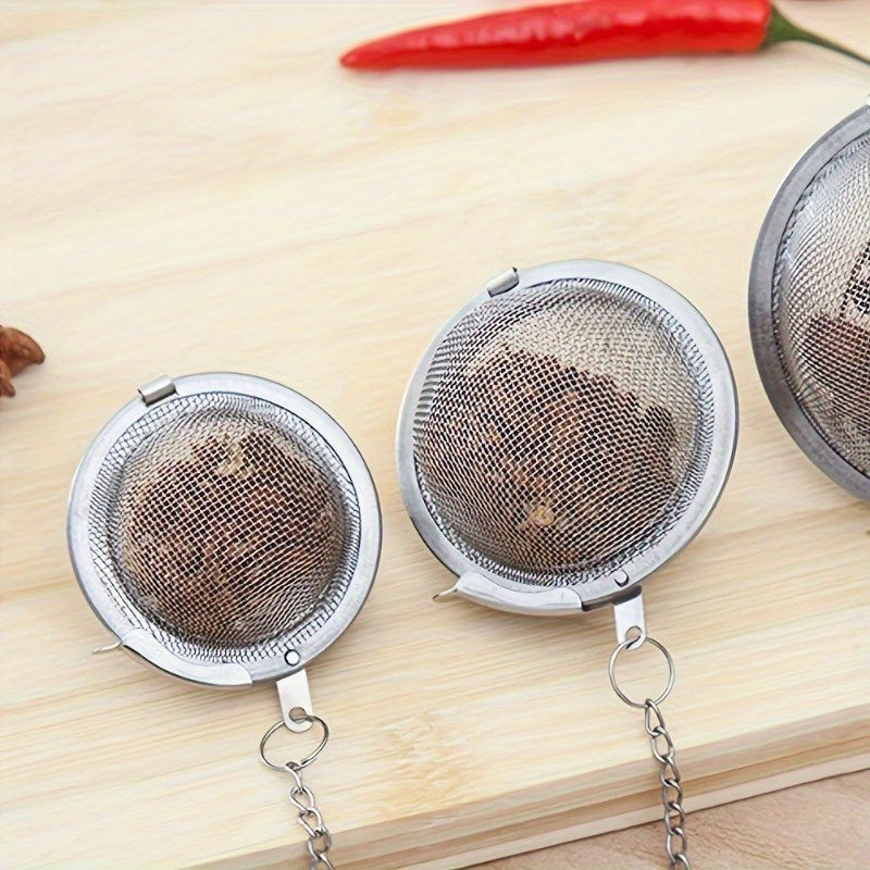 Set of three stainless steel tea infusers - High-quality mesh ball strainers for loose leaf tea, spices, and herbs - Innovative kitchen accessories