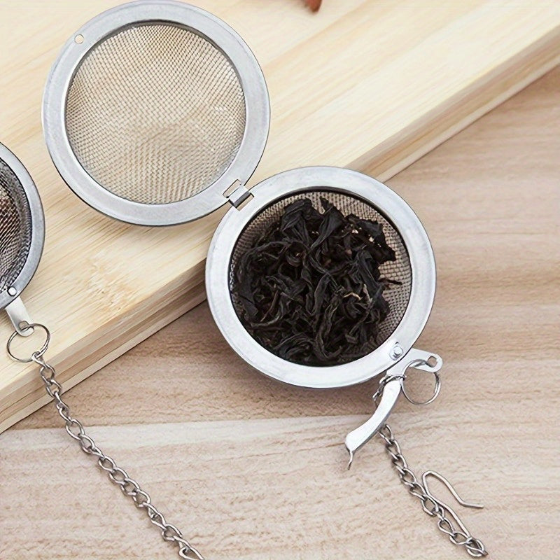 Set of three stainless steel tea infusers - High-quality mesh ball strainers for loose leaf tea, spices, and herbs - Innovative kitchen accessories