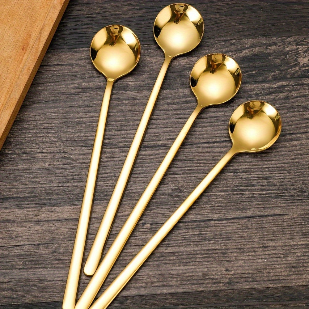 4-piece set of elegant long-handled stainless steel spoons in golden-tone, perfect for coffee, tea, and desserts. Ideal for Eid al-Adha Mubarak celebrations.