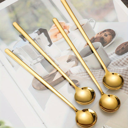 4-piece set of elegant long-handled stainless steel spoons in golden-tone, perfect for coffee, tea, and desserts. Ideal for Eid al-Adha Mubarak celebrations.