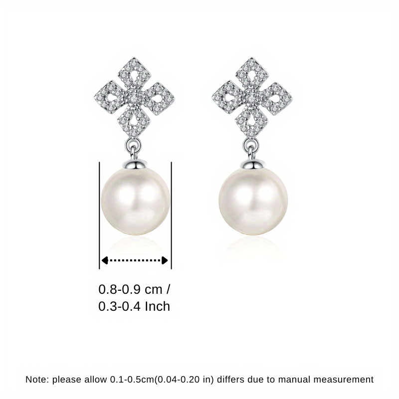 '- Two elegant stud earrings made of 925 sterling silver adorned with freshwater pearl, perfect for a vacation style look. Ideal for weddings or as a thoughtful gift for Valentine's Day. Lightweight at 2.2g, these earrings are a perfect gift for women.