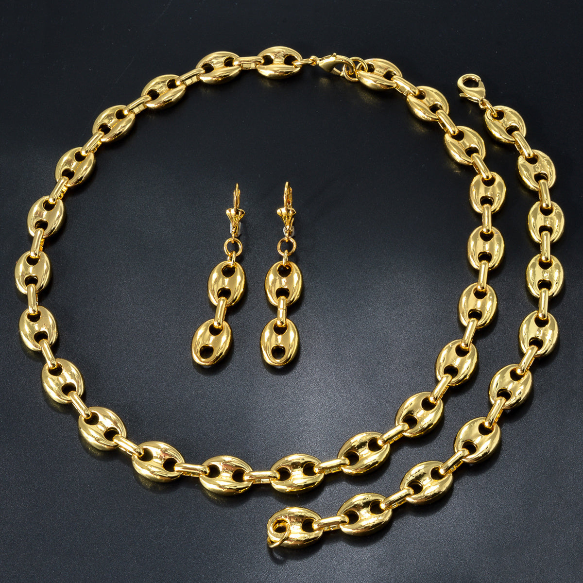 Stay stylish with this elegant and classic gold-tone copper jewelry set featuring a hip hop unisex design. This combo includes a necklace, earrings, and bracelet, making it ideal for daily wear or gift-giving. Perfect for adding a touch of glamour to any