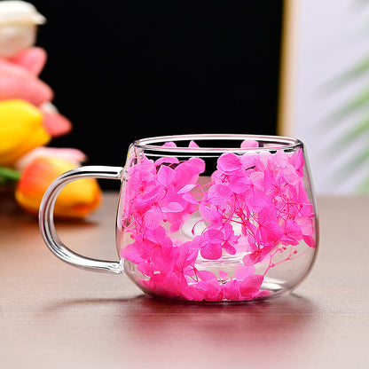 Handmade floral glass coffee mug with real dried flowers, double-walled for insulation, hand wash only, perfect for home use.