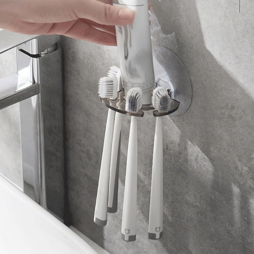 Simple wall-mounted holder for toothbrush and toothpaste, no drilling needed, saves space in the bathroom.