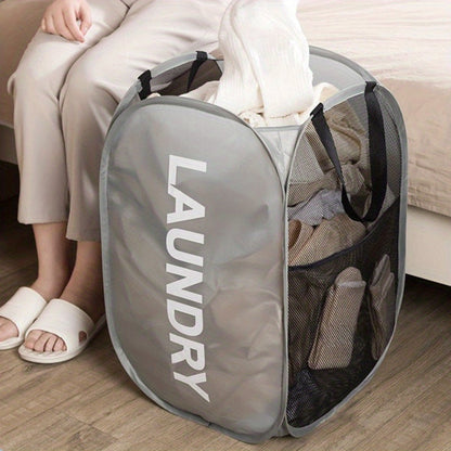 The Foldable Laundry Hamper features a spacious capacity, double-sided design, easy portability, lightweight construction, and durable fabric. Its modern rectangular shape makes it perfect for bedrooms, homes, and toy storage. No electricity needed