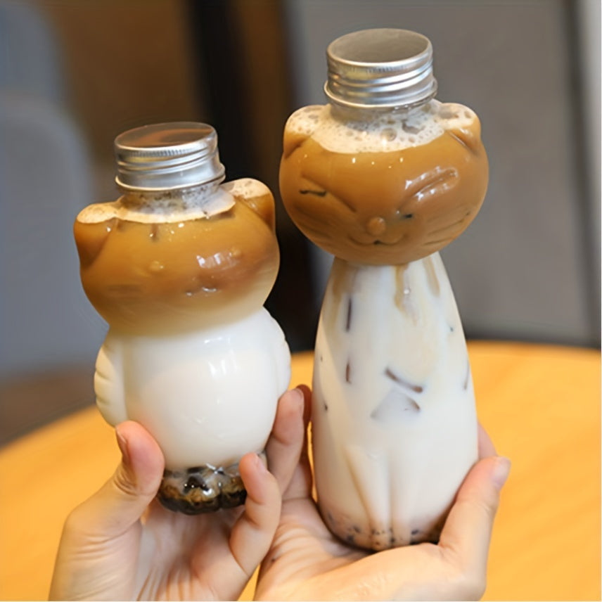 500ml cartoon cat-themed bottle, suitable for milk tea & juice, made of durable PET plastic. Great Valentine's Day gift with storage for fragrant beads and cat accessories.