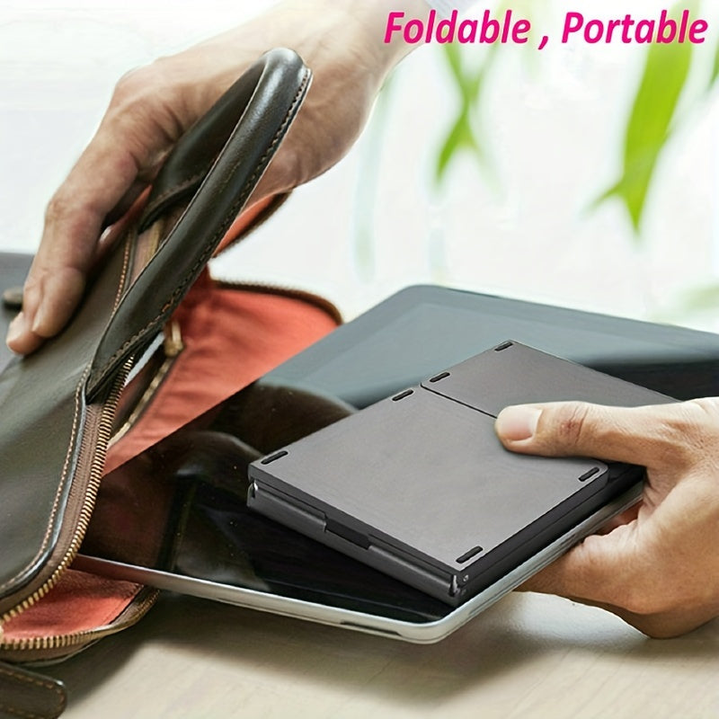 Compact foldable wireless keyboard with touchpad for Windows, Android, iOS, and Mac devices, perfect for tablets and smartphones.