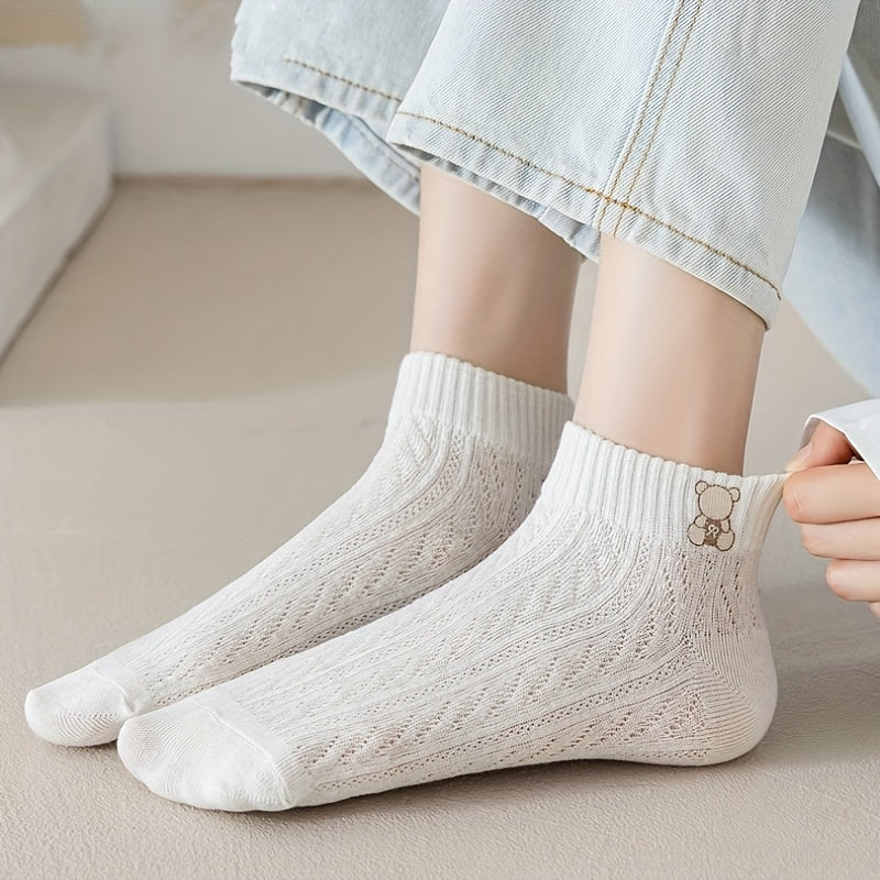 Five pairs of adorable ankle socks with cartoon patterns, breathable woven design, and cute embossed details, perfect for women's stockings.