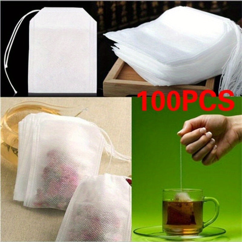 100 premium drawstring tea bags made of white non-woven fabric measuring 5.51X7.01cm, perfect for loose leaf tea, herbs, and spices.