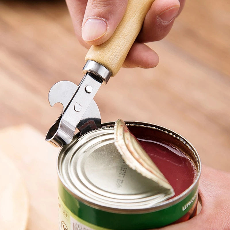 High-quality stainless steel can opener with wooden handle for easy grip. Suitable for kitchen, restaurants, and bars. Safe manual jar and bottle opener.