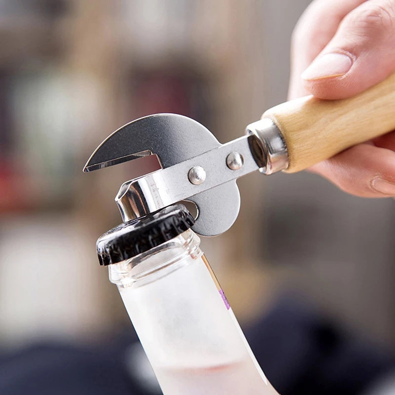 High-quality stainless steel can opener with wooden handle for easy grip. Suitable for kitchen, restaurants, and bars. Safe manual jar and bottle opener.