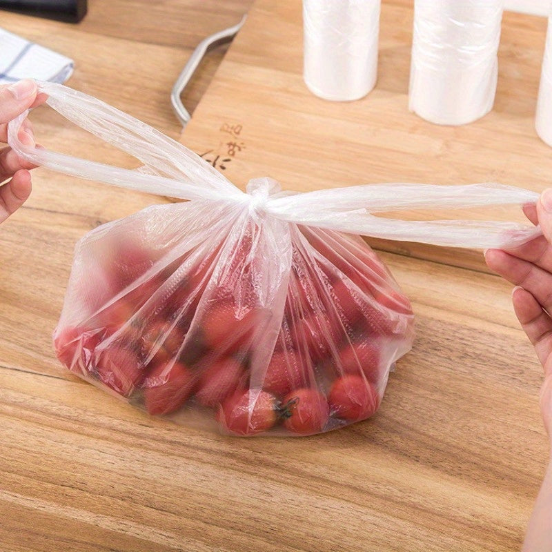 Large Refrigerator Rolling Bag with 100 pieces per roll, designed to protect and keep food fresh. This household disposable bag is thickened for durability and can be easily torn by hand. Perfect for storing vegetables, bread, and other kitchen items.