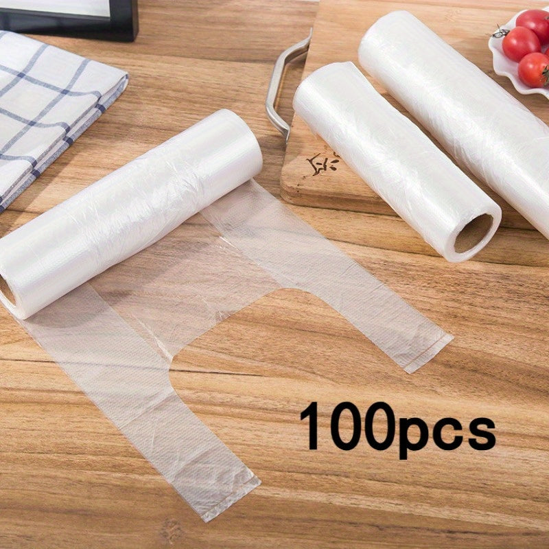 Large Refrigerator Rolling Bag with 100 pieces per roll, designed to protect and keep food fresh. This household disposable bag is thickened for durability and can be easily torn by hand. Perfect for storing vegetables, bread, and other kitchen items.