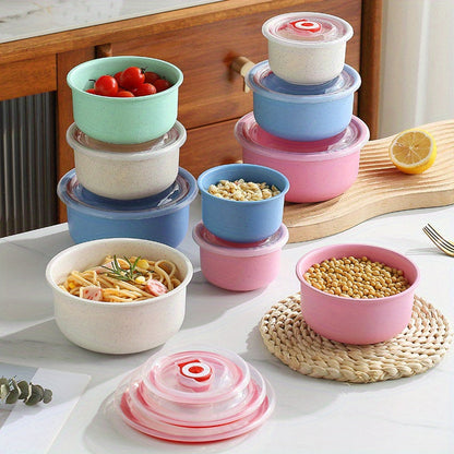 A versatile set of wheat straw bowls and food storage containers, perfect for keeping produce and dry goods fresh. These microwave-safe lunch boxes, sealed with lids, are ideal for schools, canteens, camping, picnics, and beach outings. A convenient and