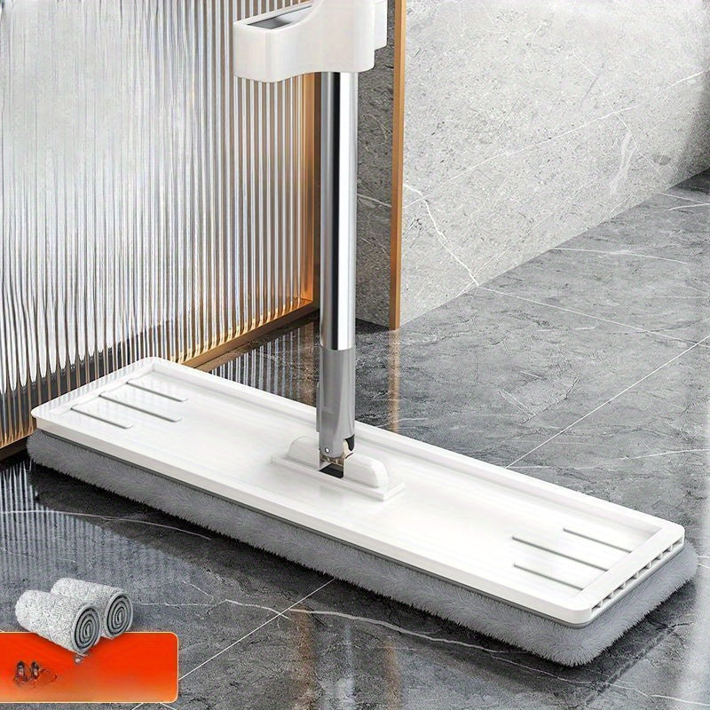 White versatile wet and dry use folding mop with dual replaceable pads is hands-free washing and ideal for use in the kitchen, bathroom, living room, or outdoors.