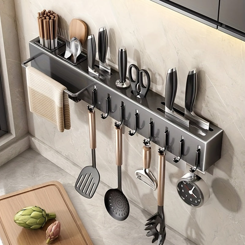 Wall-mounted stainless steel kitchen organizer featuring towel bar and hooks. Includes cutlery holder with chopstick cage for utensils and accessories.