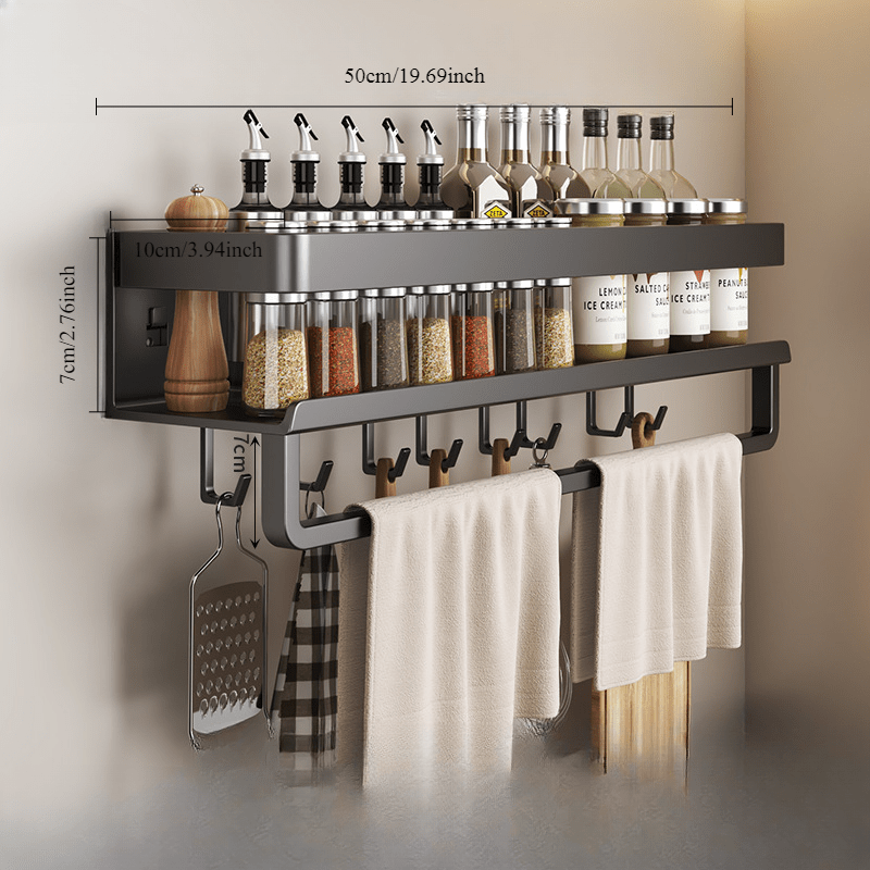 Metal storage for bathroom toiletries that does not require drilling, featuring a spice rack, utensil holder, and towel bar, all in one wall-mounted kitchen organizer.