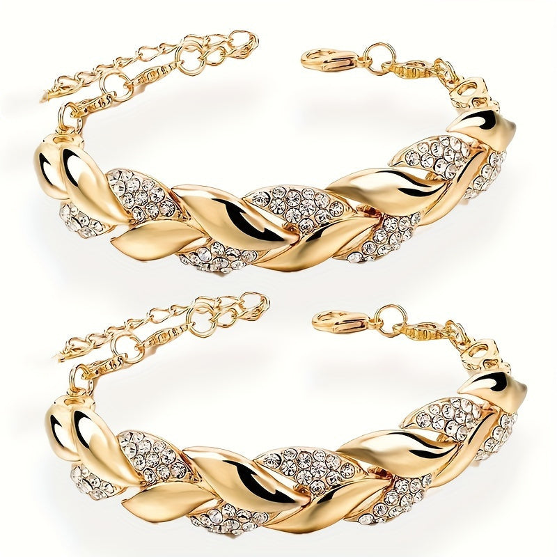 Leaf-themed 2-piece alloy bracelet set with rhinestone design, ideal for daily wear or gifting.