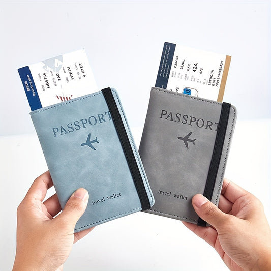 Stylish RFID blocking passport holder in light blue or charcoal with multi-functional design for airplane tickets and cards. Secure and sleek travel accessory.