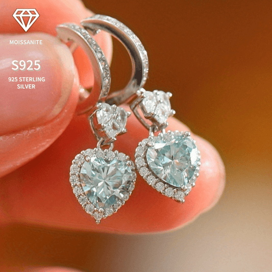 Get ready to dazzle with these Vintage Heart-Shaped Moissanite Drop Earrings. Made from 925 sterling silver with a stunning 18K golden plated finish, these elegant earrings feature two 1.0ct heart-shaped moissanite stones. Perfect for Valentine's Day or