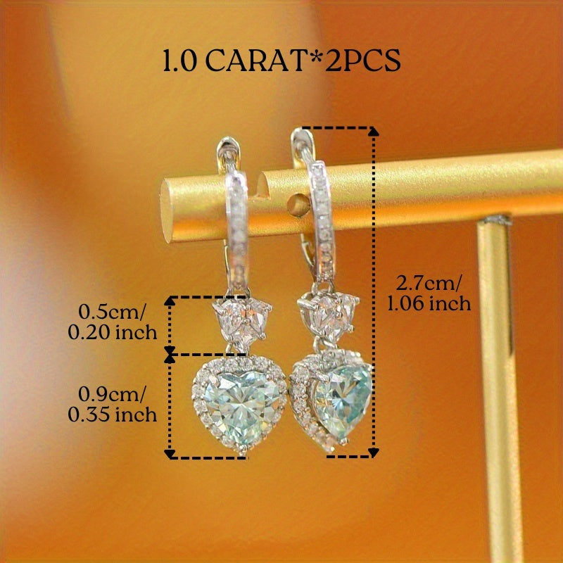 Get ready to dazzle with these Vintage Heart-Shaped Moissanite Drop Earrings. Made from 925 sterling silver with a stunning 18K golden plated finish, these elegant earrings feature two 1.0ct heart-shaped moissanite stones. Perfect for Valentine's Day or