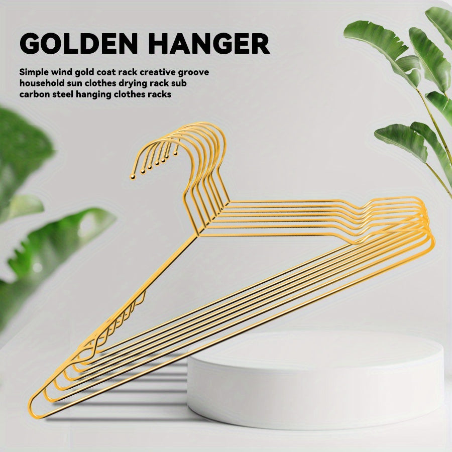 Fan Favorite: Set of 10 metal clothes hangers featuring elegant gold plating for a luxurious touch. Each hanger measures 39.88 cm and is perfect for organizing your wardrobe at home.