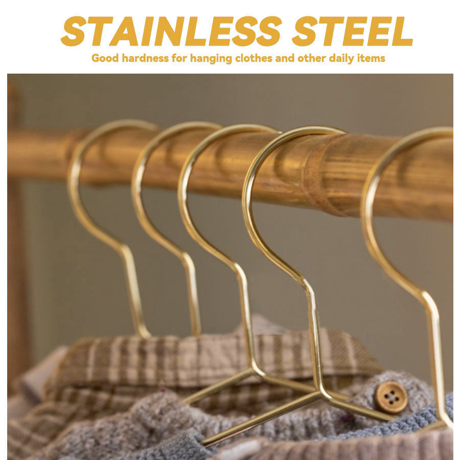 Fan Favorite: Set of 10 metal clothes hangers featuring elegant gold plating for a luxurious touch. Each hanger measures 39.88 cm and is perfect for organizing your wardrobe at home.