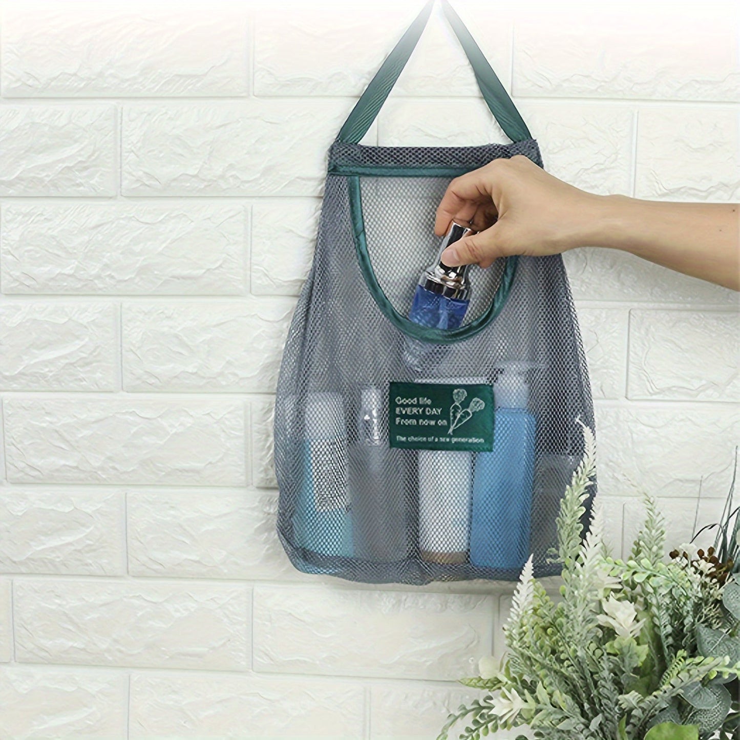 This heavy-duty hanging mesh storage bag with drawstring closure is ideal for organizing garlic, potatoes, and onions. Made of durable plastic with a breathable design, it is perfect for kitchen organization. The hanging produce bags feature visible