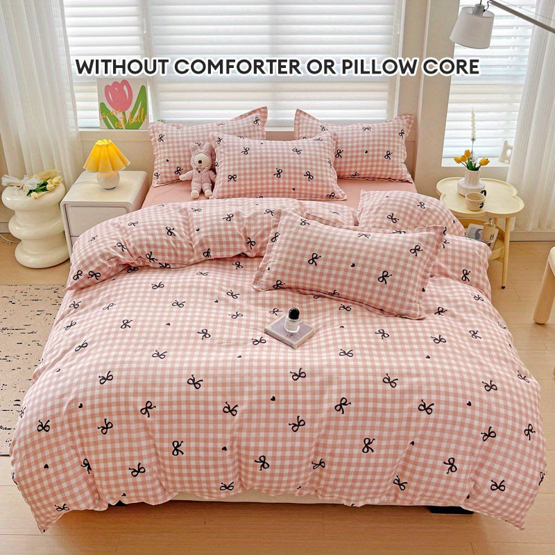 Pink plaid duvet cover set with bowknot pattern, 4 pieces - includes 1 duvet cover, 2 pillowcases, 1 flat sheet. Made of 100% polyester with zipper closure, digitally printed and