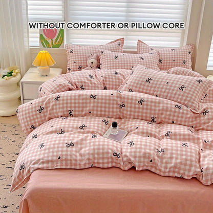 Pink plaid duvet cover set with bowknot pattern, 4 pieces - includes 1 duvet cover, 2 pillowcases, 1 flat sheet. Made of 100% polyester with zipper closure, digitally printed and