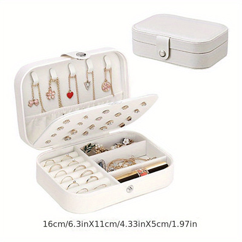 Glam style faux leather jewelry organizer box with double layer, soft lining, secure zipper closure, and textured finish. Tabletop display case for earrings, necklaces, and rings. Multipurpose desktop accessory for organization.