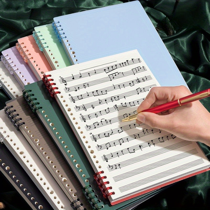 B5 Music Notation Notebook with 60 sheets of reusable loose-leaf staff paper. Ideal for musicians and composers for practice and composition.