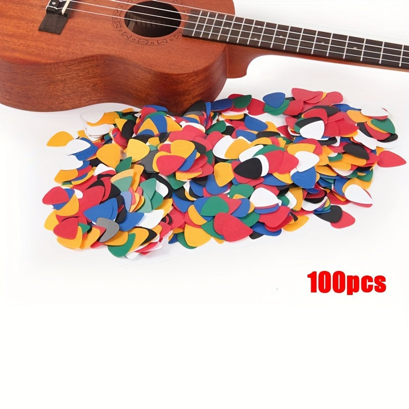 Accessories for acoustic ukuleles, basses, and electric guitars, including picks and plectrums.