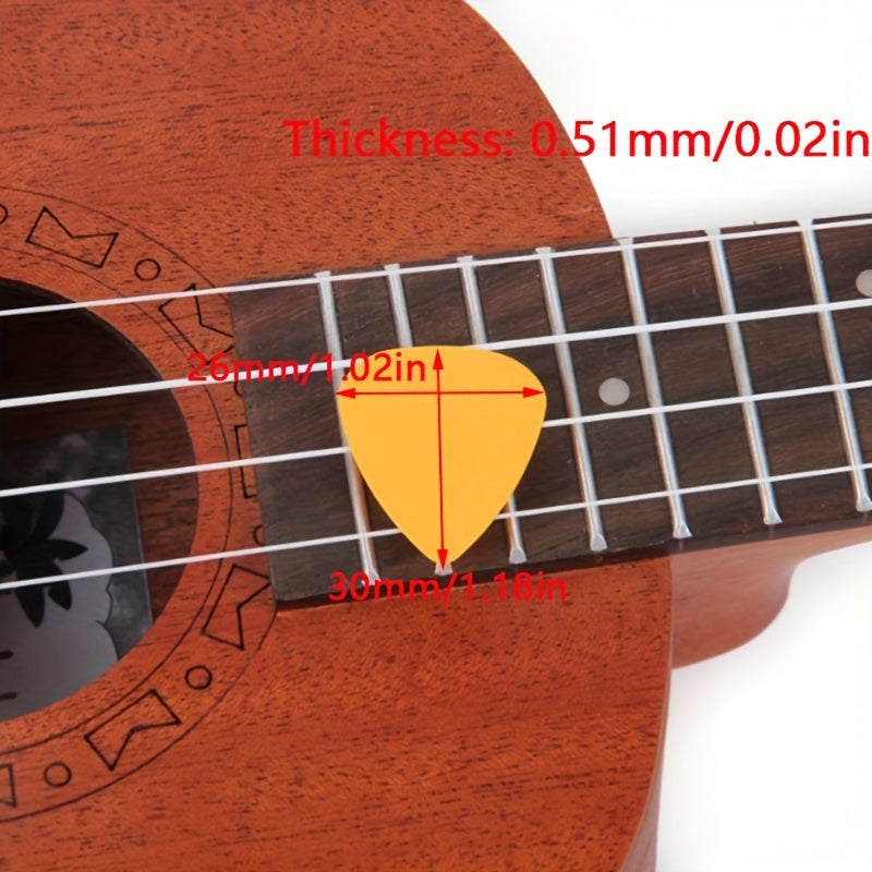 Accessories for acoustic ukuleles, basses, and electric guitars, including picks and plectrums.