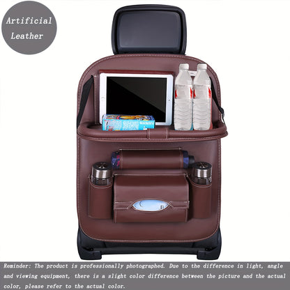 Car backseat organizer with foldable table tray made of premium PU leather for storing snacks, beverages, and entertainment items.