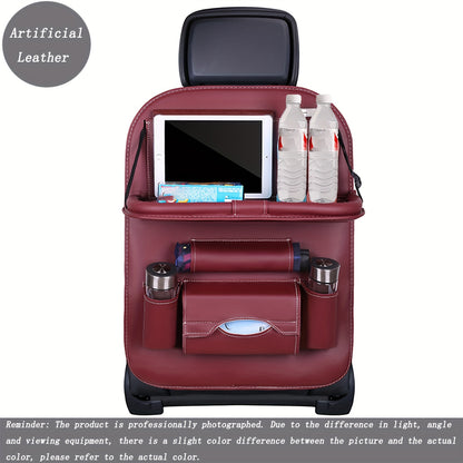 Car backseat organizer with foldable table tray made of premium PU leather for storing snacks, beverages, and entertainment items.