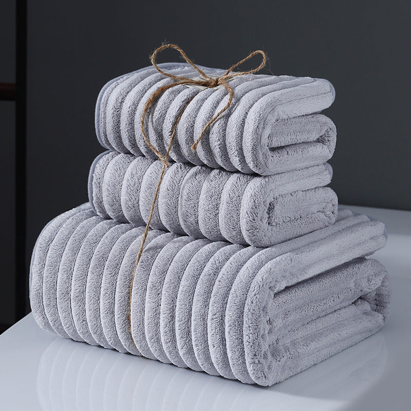 Japanese-style 3-piece coral fleece bath towel set with 350 GSM knit fabric, made of 100% polyester. Includes 1 bath towel and 2 face towels. Ultra absorbent and durable for home, hotel, and outdoor use.