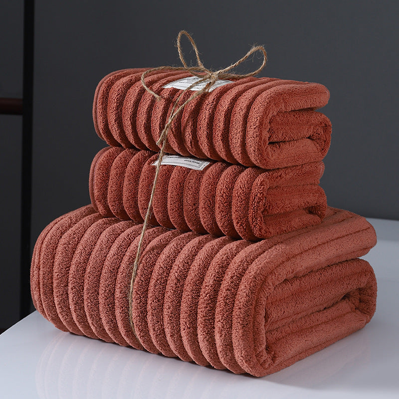 Japanese-style 3-piece coral fleece bath towel set with 350 GSM knit fabric, made of 100% polyester. Includes 1 bath towel and 2 face towels. Ultra absorbent and durable for home, hotel, and outdoor use.