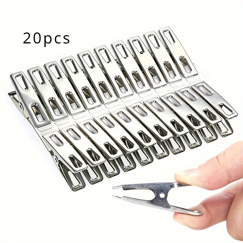 20 pieces of stainless steel clothes pegs, laundry clips, household clothes drying clips. These strong windproof fixed clips are perfect for securing clothes. They can be used as clothes pegs, clothes pins, metal clamps, or multifunctional small clips.