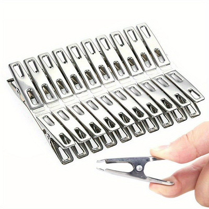 20 pieces of stainless steel clothes pegs, laundry clips, household clothes drying clips. These strong windproof fixed clips are perfect for securing clothes. They can be used as clothes pegs, clothes pins, metal clamps, or multifunctional small clips.