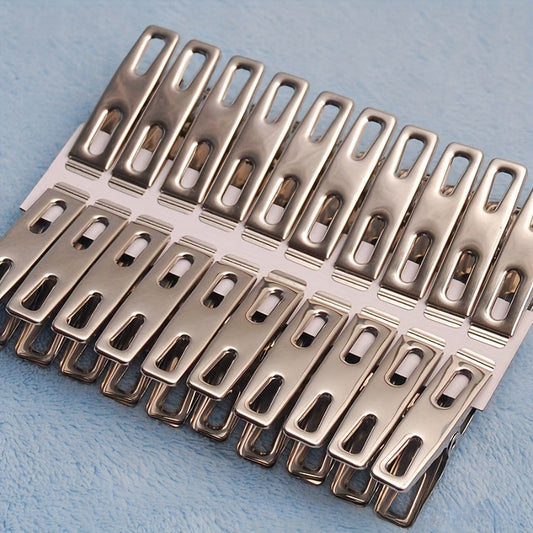 20 pieces of stainless steel clothes pegs, laundry clips, household clothes drying clips. These strong windproof fixed clips are perfect for securing clothes. They can be used as clothes pegs, clothes pins, metal clamps, or multifunctional small clips.