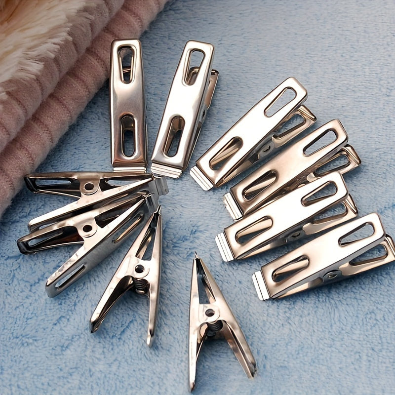 20 pieces of stainless steel clothes pegs, laundry clips, household clothes drying clips. These strong windproof fixed clips are perfect for securing clothes. They can be used as clothes pegs, clothes pins, metal clamps, or multifunctional small clips.