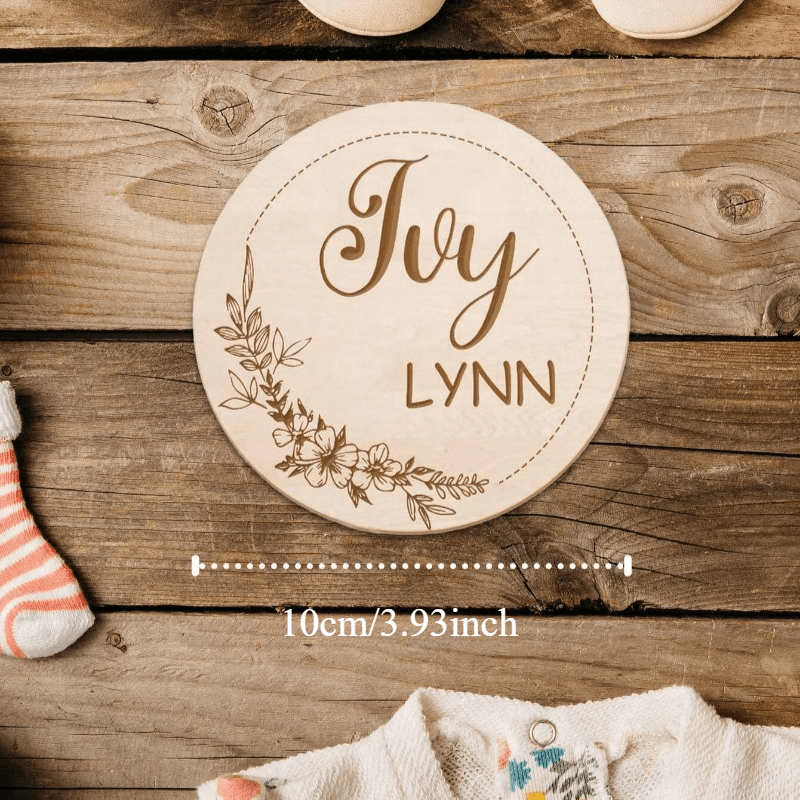 Customize your nursery decor with a personalized wooden name sign! This round plaque can be customized with a footprint and makes for a unique shower gift or photo prop.