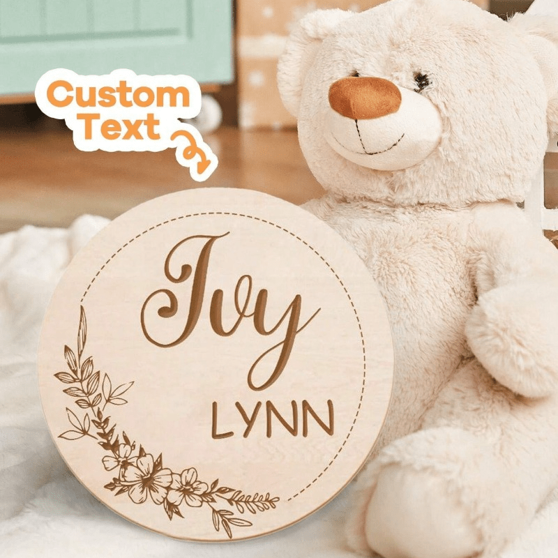 Customize your nursery decor with a personalized wooden name sign! This round plaque can be customized with a footprint and makes for a unique shower gift or photo prop.