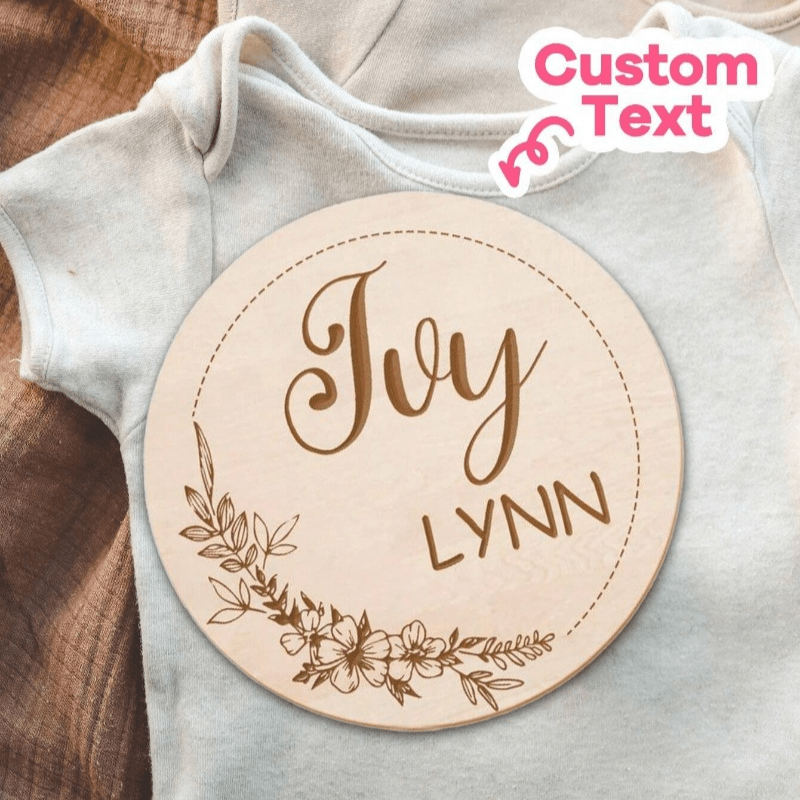 Customize your nursery decor with a personalized wooden name sign! This round plaque can be customized with a footprint and makes for a unique shower gift or photo prop.