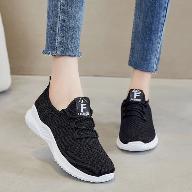 One pair of lightweight, breathable women's sports shoes suitable for vacations.